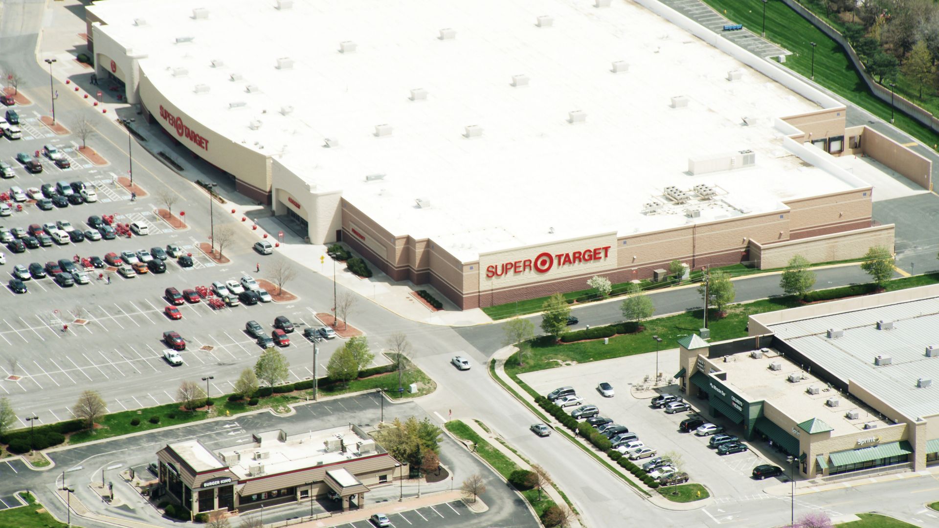 Target market with cool roof system containing white reflective roofing membrane